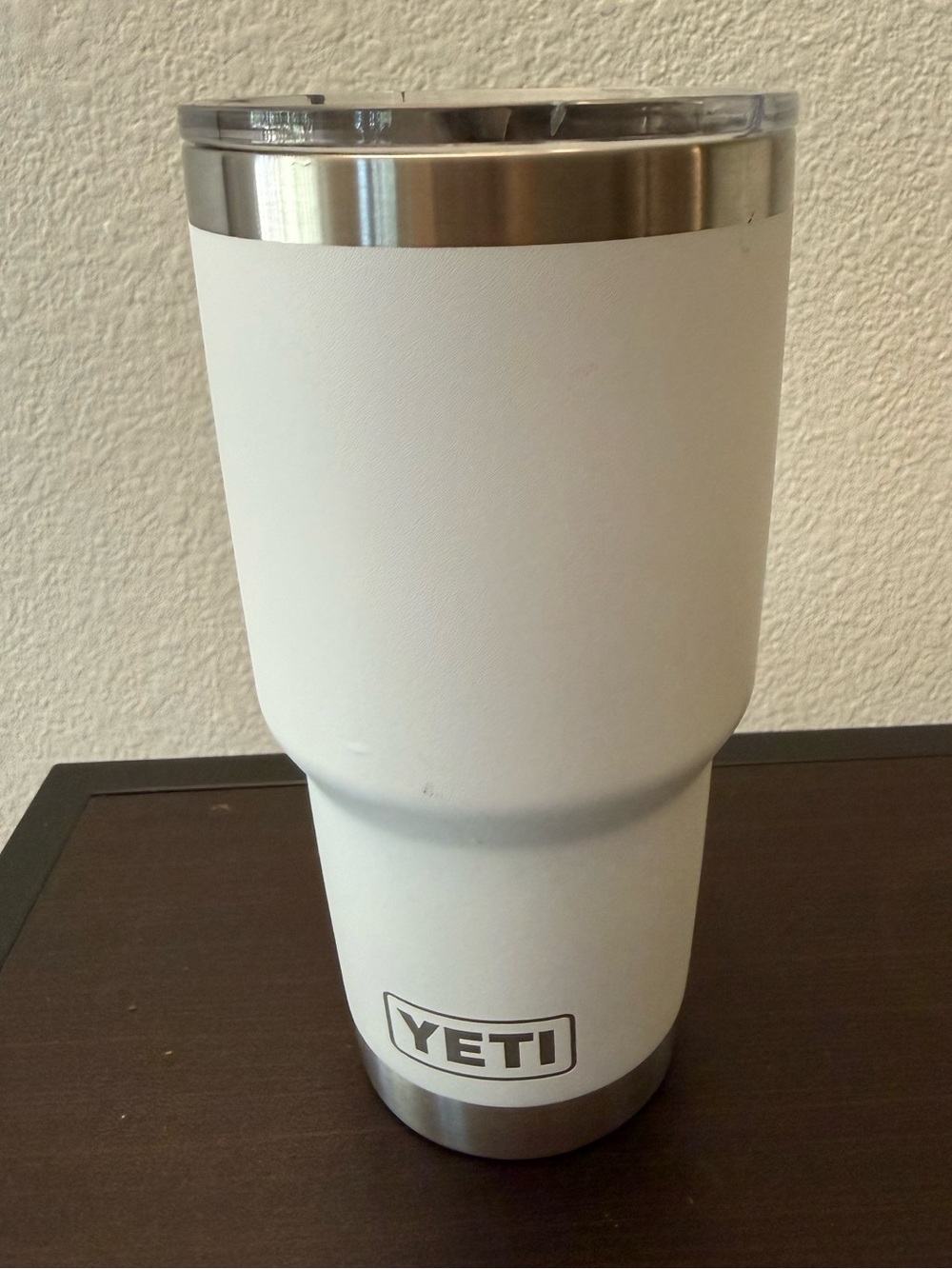 White YETI Rambler Tumbler with company logo